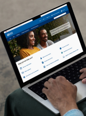 someone with a laptop with the IRS website